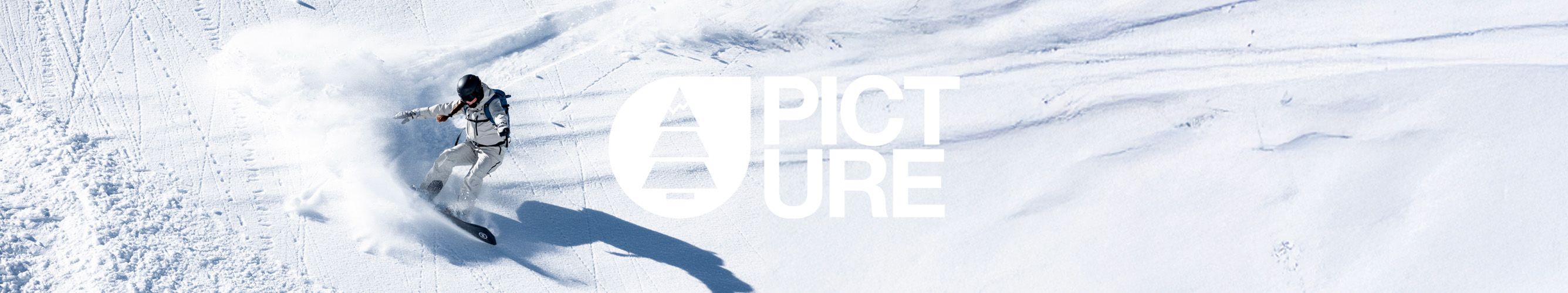 snowboarder snowboardt van een berg met het logo van picture in het midden